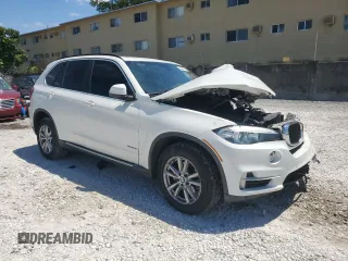2014 BMW X5 xDrive35i with VIN 5UXKR0C52E0H20513, listed as a Copart auction lot 52831615 with 111,414 mi miles and Salvage Title. Bid and sale history available at carsss.com. Image 4.