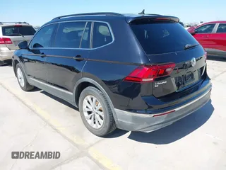 2018 Volkswagen Tiguan SEL with VIN 3VV3B7AX3JM064061, listed as a IAAI auction lot 41772564 with 95,395 mi miles and . Bid and sale history available at DreamBid. Image 3.