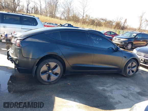 2020 Tesla Model 3 Standard Range Plus with VIN 5YJ3E1EA4LF745491, listed as a IAAI auction lot 41186726 with 74,575 mi miles and . Bid and sale history available at DreamBid. Image 13.