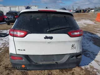 2015 Jeep Cherokee North with VIN 1C4PJMCS7FW792850, listed as a IAAI auction lot 41323432 with 102,642 mi miles. Bid and sale history available at carsss.com. Image 16.