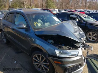 2018 Audi Q3 Premium with VIN WA1ECCFS9JR022013, listed as a IAAI auction lot 40960982 with 50,663 mi miles. Bid and sale history available at carsss.com. Image 1.