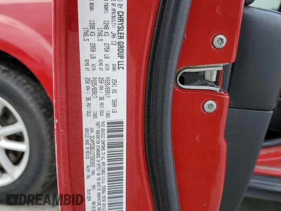 2013 Dodge Journey SXT with VIN 3C4PDDBG1DT593302, listed as a Copart auction lot 44517955 with 176,136 mi miles and Salvage title. Bid and sale history available at DreamBid. Image 13.