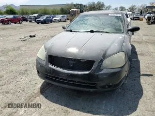 2006 Nissan Altima SL z VIN 1N4BL11E96C242315, wystawiony jako Copart lot #55455065 z przebiegiem Nie podano mil oraz Szkoda całkowita • Salvage title. Historia ofert i sprzedaży dostępna na DreamBid. Obrazek 13.