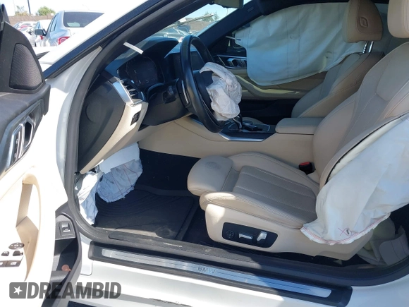2022 BMW 4 Series 430i xDrive with VIN WBA73AP03NCH61029, listed as a IAAI auction lot 42327779 with 104,860 mi miles and . Bid and sale history available at DreamBid. Image 5.