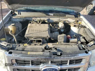 2011 Ford Escape Limited with VIN 1FMCU9EG2BKA74440, listed as a Copart auction lot 61081835 with 136,933 mi miles and Salvage title. Bid and sale history available at DreamBid. Image 12.