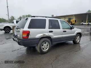 2004 Jeep Grand Cherokee Laredo z VIN 1J4GW48S74C288625, wystawiony jako Copart lot #61290805 z przebiegiem 194 615 mil mil oraz Czysty tytuł • Clean title. Historia ofert i sprzedaży dostępna na DreamBid. Obrazek 3.