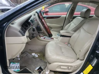2003 Lexus ES 300 with VIN JTHBF30G036009951, listed as a Copart auction lot 50021235 with 231,411 mi miles and Salvage Title. Bid and sale history available at DreamBid. Image 7.