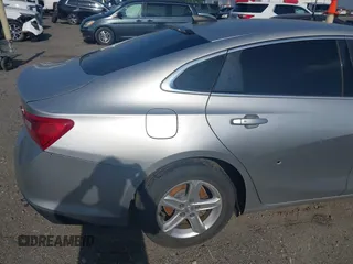 2019 Chevrolet Malibu LS with VIN 1G1ZB5STXKF147683, listed as a IAAI auction lot 42123608 with 104,692 mi miles and . Bid and sale history available at DreamBid. Image 19.