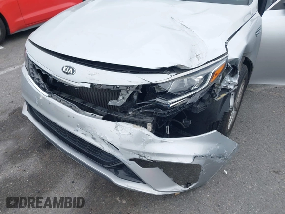 2019 Kia Optima LX z VIN 5XXGT4L3XKG285486, wystawiony jako IAAI lot #41872981 z przebiegiem 101 981 mil mil oraz . Historia ofert i sprzedaży dostępna na DreamBid. Obrazek 6.