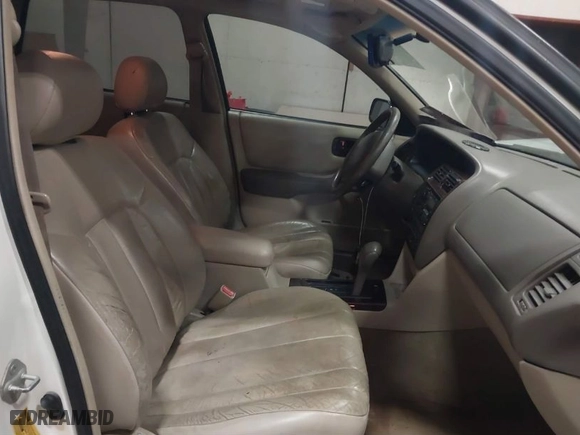 1999 Toyota Avalon XL with VIN 4T1BF18B2XU293904, listed as a IAAI auction lot 41645137 with NaN miles. Bid and sale history available at carsss.com. Image 5.