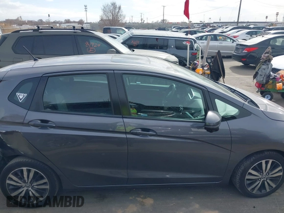 2015 Honda Fit EX-L with VIN 3HGGK5H89FM742260, listed as a IAAI auction lot 41707676 with 97,543 mi miles. Bid and sale history available at carsss.com. Image 13.