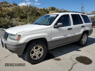 2003 Jeep Grand Cherokee Laredo with VIN 1J4GW48S83C517330, listed as a Copart auction lot 52765415 with 108,920 mi miles and Salvage title. Bid and sale history available at DreamBid. Image 1.