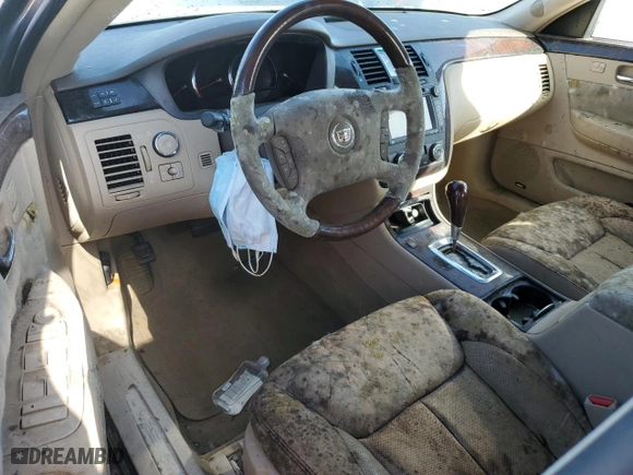 2006 Cadillac DTS w/1SE with VIN 1G6KD57996U133097, listed as a Copart auction lot 77673764 with 0 mi miles and Salvage Title. Bid and sale history available at carsss.com. Image 8.
