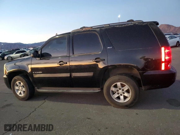 2008 GMC Yukon SLT w/4SA with VIN 1GKFK13028J229876, listed as a Copart auction lot 82113734 with 150,461 mi miles and Salvage Title. Bid and sale history available at carsss.com. Image 2.