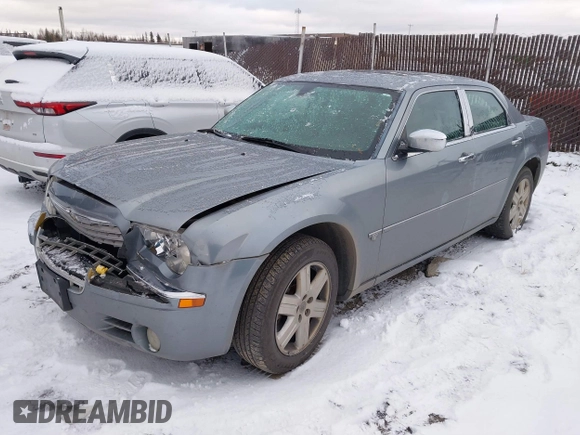 2006 Chrysler 300 C with VIN 2C3KK63H66H382504, listed as a IAAI auction lot 40599570 with 161,754 mi miles. Bid and sale history available at carsss.com. Image 2.