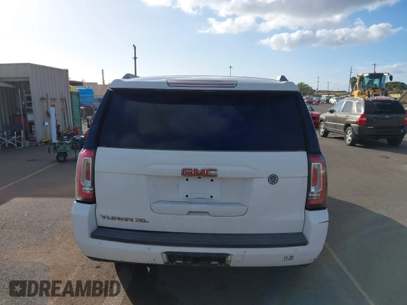 2015 GMC Yukon XL SLT with VIN 1GKS1HKC2FR612690, listed as a IAAI auction lot 41234188 with 113,830 mi miles. Bid and sale history available at carsss.com. Image 16.