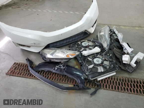 2016 Honda Fit EX with VIN JHMGK5H74GX046356, listed as a Copart auction lot 50905275 with 121,707 mi miles and Salvage title. Bid and sale history available at DreamBid. Image 14.