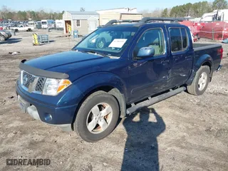 2006 Nissan Frontier LE with VIN 1N6AD07U26C469189, listed as a IAAI auction lot 41780595 with 146,000 mi miles. Bid and sale history available at carsss.com. Image 2.