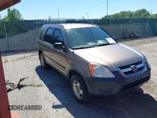 2004 Honda CR-V LX with VIN JHLRD784X4C015401, listed as a IAAI auction lot 39704765 with 158,987 mi miles and . Bid and sale history available at carsss.com. Image 1.