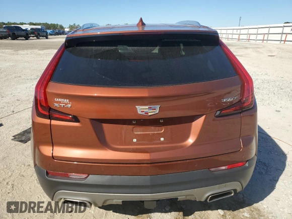 2021 Cadillac XT4 FWD Premium Luxury z VIN 1GYFZCR46MF076066, wystawiony jako Copart lot #47493235 z przebiegiem 21 550 mil mil oraz Nie do naprawy. Historia ofert i sprzedaży dostępna na DreamBid. Obrazek 6.