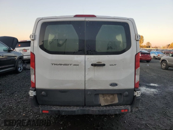 2019 Ford Transit Passenger XL z VIN 1FBZX2ZM9KKB05264, wystawiony jako Copart lot #78943974 z przebiegiem Nie podano mil oraz Szkody całkowita. Historia ofert i sprzedaży dostępna na DreamBid. Obrazek 6.