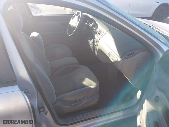 2003 Ford Taurus SE Standard with VIN 1FAFP53U23A245453, listed as a IAAI auction lot 41680402 with 96,761 mi miles. Bid and sale history available at carsss.com. Image 5.