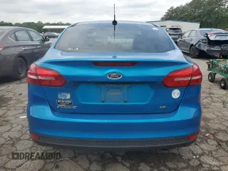 2016 Ford Focus SE z VIN 1FADP3F21GL400767, wystawiony jako Copart lot #52174835 z przebiegiem 141 264 mil mil oraz Szkoda całkowita • Salvage title. Historia ofert i sprzedaży dostępna na DreamBid. Obrazek 6.