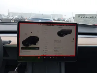 2023 Tesla Model Y Long Range z VIN 7SAYGDEEXPA181114, wystawiony jako IAAI lot #41564617 z przebiegiem 64 990 mil mil oraz . Historia ofert i sprzedaży dostępna na DreamBid. Obrazek 19.