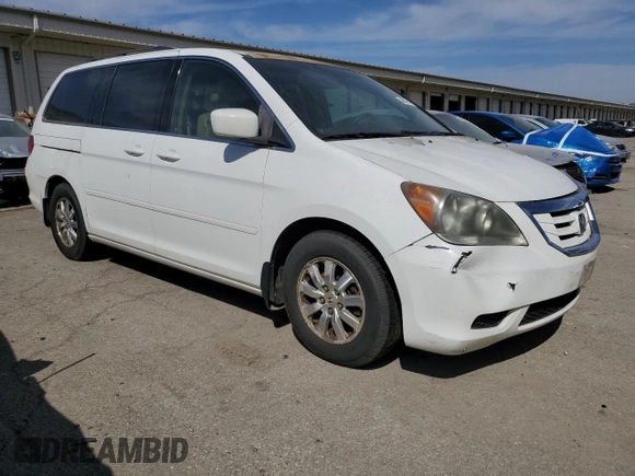 2010 Honda Odyssey EX-L with VIN 5FNRL3H77AB051869, listed as a Copart auction lot 48473815 with 248,511 mi miles and Salvage Title. Bid and sale history available at DreamBid. Image 4.