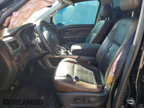 2016 Nissan Titan Platinum Reserve z VIN 1N6BA1F28GN508716, wystawiony jako Copart lot #46797225 z przebiegiem 168 572 mil mil oraz Szkoda całkowita • Salvage title. Historia ofert i sprzedaży dostępna na DreamBid. Obrazek 7.