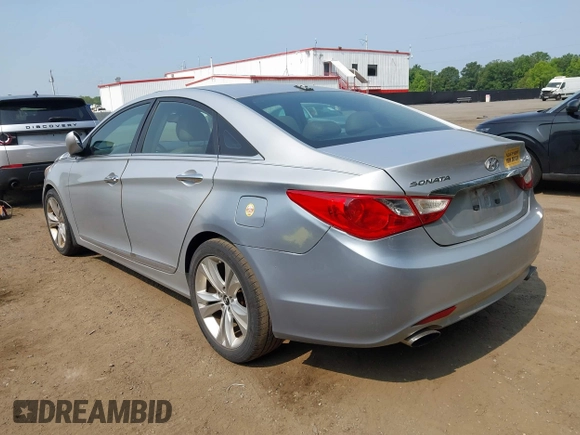 2012 Hyundai Sonata Limited z VIN 5NPEC4AB0CH451960, wystawiony jako IAAI lot #42489513 z przebiegiem 174 310 mil mil oraz . Historia ofert i sprzedaży dostępna na DreamBid. Obrazek 3.