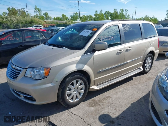 2013 Chrysler Town & Country Touring with VIN 2C4RC1BGXDR646625, listed as a IAAI auction lot 42248297 with 141,943 mi miles and . Bid and sale history available at DreamBid. Image 2.