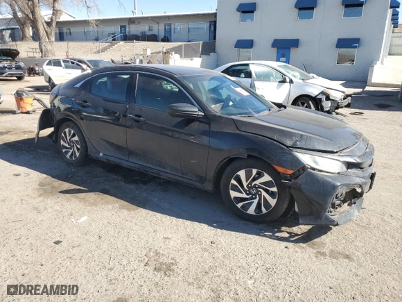 2018 Honda Civic Hatchback LX with VIN SHHFK7H25JU230895, listed as a Copart auction lot 43580455 with 73,104 mi miles and Salvage Title. Bid and sale history available at carsss.com. Image 4.