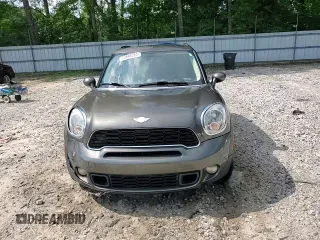 2014 MINI Countryman S with VIN WMWZC3C57EWP25099, listed as a Copart auction lot 62646555 with 153,059 mi miles and Salvage title. Bid and sale history available at DreamBid. Image 13.