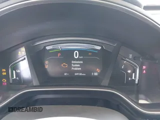 2020 Honda CR-V Touring z VIN 7FART6H91LE000684, wystawiony jako IAAI lot #42504731 z przebiegiem 49 100 mil mil oraz . Historia ofert i sprzedaży dostępna na DreamBid. Obrazek 7.