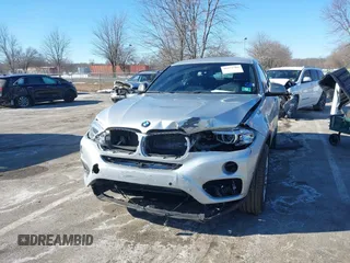 2018 BMW X6 xDrive35i with VIN 5UXKU2C50J0X51275, listed as a IAAI auction lot 41421704 with 165,052 mi miles. Bid and sale history available at carsss.com. Image 6.