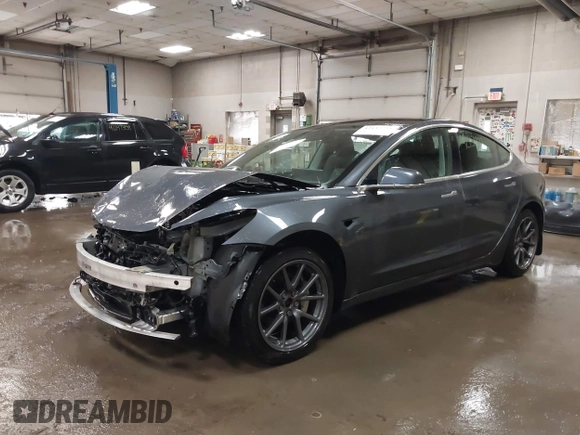 2020 Tesla Model 3 Long Range z VIN 5YJ3E1EB0LF800804, wystawiony jako IAAI lot #42137223 z przebiegiem 52 482 mil mil oraz . Historia ofert i sprzedaży dostępna na DreamBid. Obrazek 2.