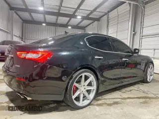 2014 Maserati Ghibli S Q4 z VIN ZAM57RTA9E1112724, wystawiony jako Copart lot #57189295 z przebiegiem 45 525 mil mil oraz Szkody całkowita. Historia ofert i sprzedaży dostępna na DreamBid. Obrazek 4.