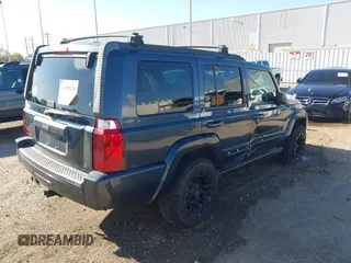 2007 Jeep Commander Sport with VIN 1J8HG48K87C666634, listed as a IAAI auction lot 41850134 with 162,208 mi miles. Bid and sale history available at carsss.com. Image 4.