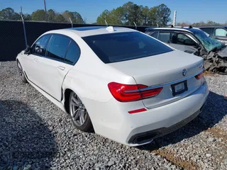 2017 BMW 7 Series 750i with VIN WBA7F0C34HGM21738, listed as a IAAI auction lot 41772933 with 62,923 mi miles and . Bid and sale history available at carsss.com. Image 3.