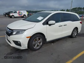 2019 Honda Odyssey EX-L with VIN 5FNRL6H70KB083596, listed as a IAAI auction lot 42072667 with 153,087 mi miles and . Bid and sale history available at DreamBid. Image 2.