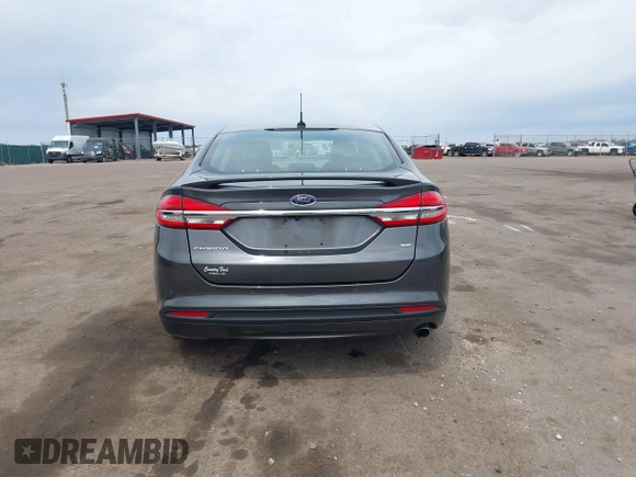 2017 Ford Fusion SE z VIN 3FA6P0H76HR354078, wystawiony jako IAAI lot #42103550 z przebiegiem 103 201 mil mil oraz . Historia ofert i sprzedaży dostępna na DreamBid. Obrazek 16.