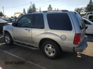 2002 Ford Explorer with VIN 1FMCU60E52UB90353, listed as a Copart auction lot 75659554 with 212,592 mi miles and Salvage title. Bid and sale history available at DreamBid. Image 2.