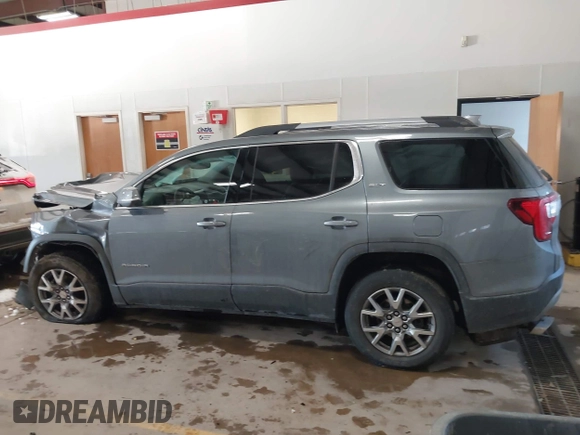 2021 GMC Acadia SLT z VIN 1GKKNMLS5MZ230427, wystawiony jako IAAI lot #41345085 z przebiegiem 59 084 mil mil oraz . Historia ofert i sprzedaży dostępna na DreamBid. Obrazek 13.