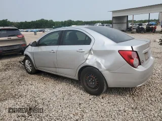 2015 Chevrolet Sonic LS with VIN 1G1JA5SH6F4152196, listed as a Copart auction lot 59096455 with 128,113 mi miles and Salvage title. Bid and sale history available at DreamBid. Image 2.