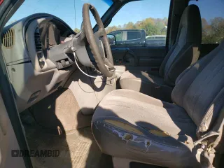 2000 Chevrolet Astro with VIN 1GNDM19W6YB180580, listed as a Copart auction lot 77676494 with 413,650 mi miles and Salvage Title. Bid and sale history available at carsss.com. Image 7.