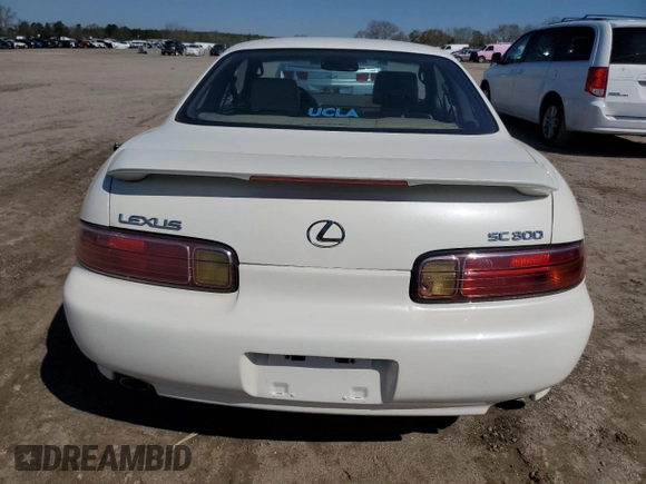 1998 Lexus SC 300 z VIN JT8CD32Z5W1004027, wystawiony jako Copart lot #48164775 z przebiegiem 132 030 mil mil oraz Szkody całkowita. Historia ofert i sprzedaży dostępna na DreamBid. Obrazek 6.