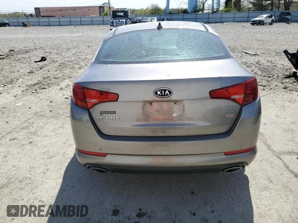 2012 Kia Optima LX with VIN 5XXGM4A70CG063950, listed as a Copart auction lot 54196405 with 93,291 mi miles and Salvage Title. Bid and sale history available at carsss.com. Image 6.