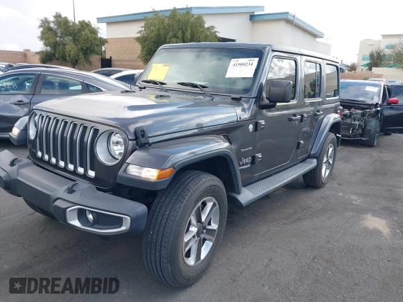 2021 Jeep Wrangler Unlimited Sahara with VIN 1C4HJXEN4MW503014, listed as a IAAI auction lot 41900234 with 16,444 mi miles and . Bid and sale history available at DreamBid. Image 2.
