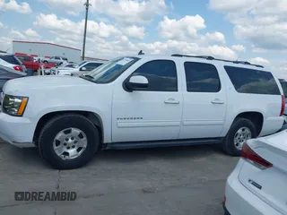 2013 Chevrolet Suburban LT with VIN 1GNSCJE08DR102735, listed as a IAAI auction lot 42228063 with 101,671 mi miles and . Bid and sale history available at DreamBid. Image 15.